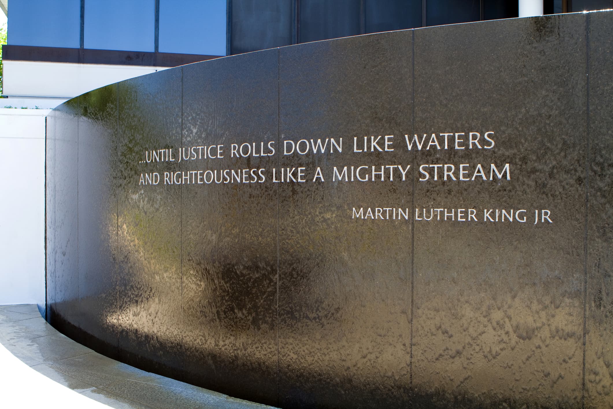 A view of the Civil Rights Memorial in Montgomery, Alabama, with a quote from Martin Luther King Jr.